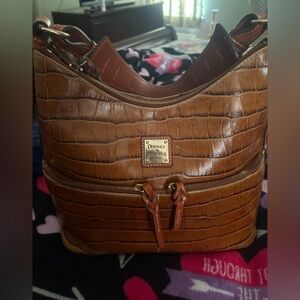 Vintage Embossed Leather Dooney & Bourke with dust bag. Medium purse 12x 16